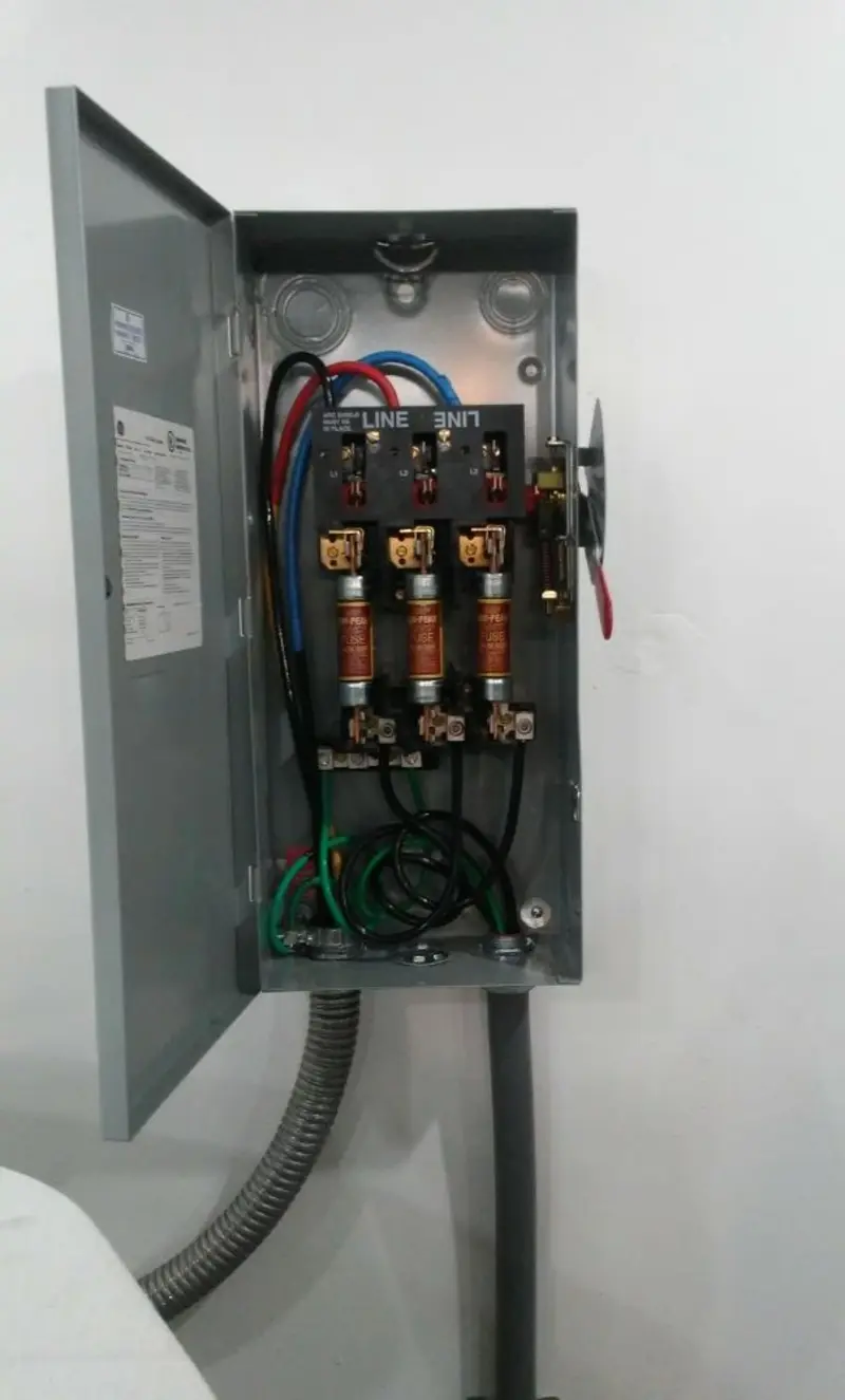 Three-phase disconnect switch installed for Smoke Detector Installation in Cannon